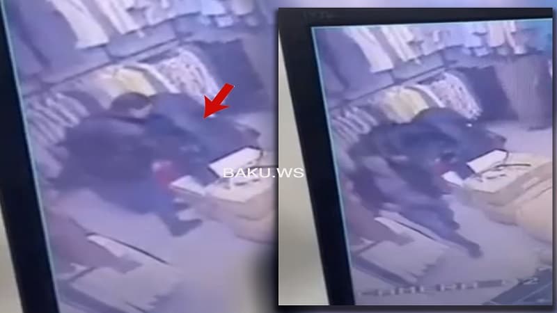 Qadın mağazadan pulqabını belə oğurladı (VİDEO)