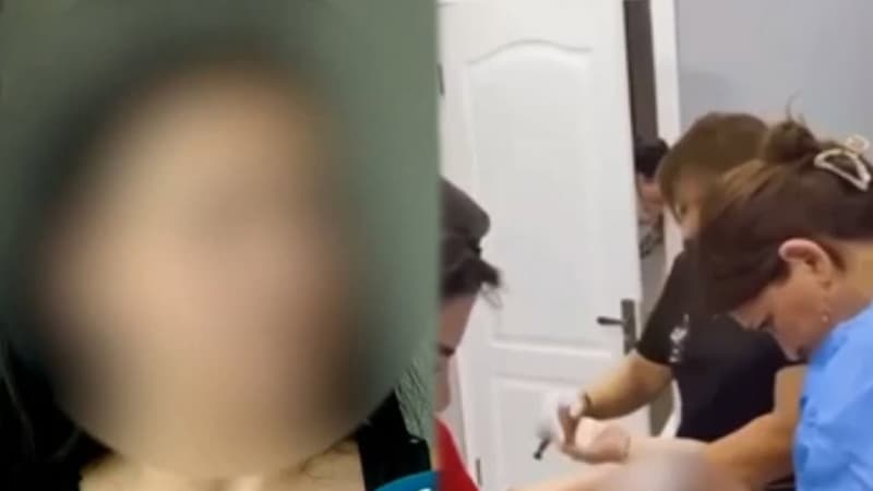 Qapıdan baxan qeydiyyatçı oğlan imiş - Videodakı qadın danışdı