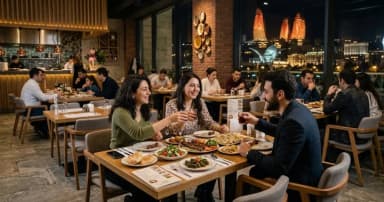 Restoranlarda 100 manatlıq depozit tələbi - İqtisadçıdan açıqlama