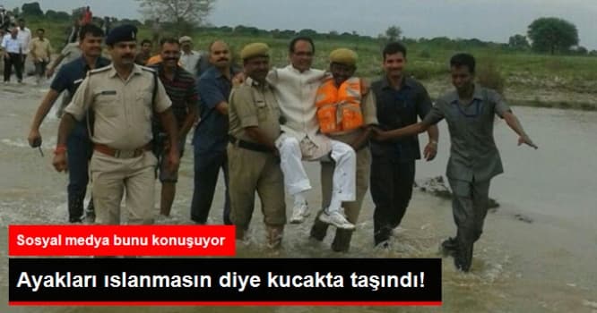 Baş naziri qucaqlarına aldılar - Ayağı su olmasın deyə