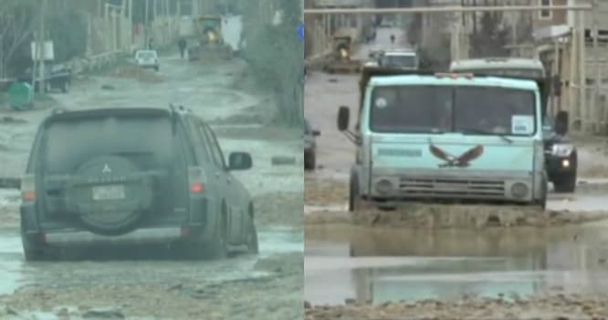 Binəqədinin keçilməz yolları: üzən "Kamaz", batan maşın... - VİDEO