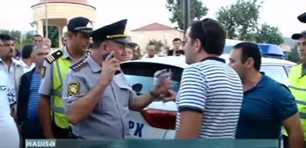 Avtoxuliqanlıq edən sürücü polislə əlbəyaxa oldu (VİDEO)