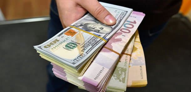 Azərbaycanda dollar ucuzlaşdı