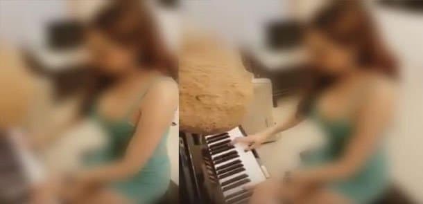 Bu qızın geyimi, ifası rekord qırır... (VİDEO)