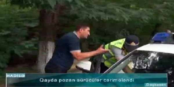 Sürücü polisə: "Yazma dedim, yekə kişisən" (VİDEO)