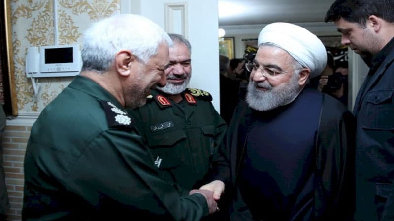 Həsən Ruhani öldürülən generalın evində (FOTO)
