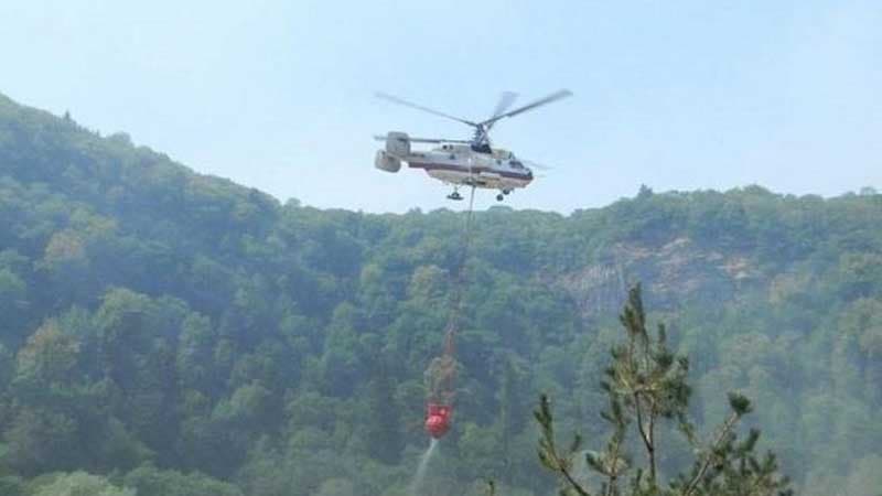 Qəbələdə meşə yanır: Söndürülməsi üçün iki helikopter cəlb olundu (VİDEO)