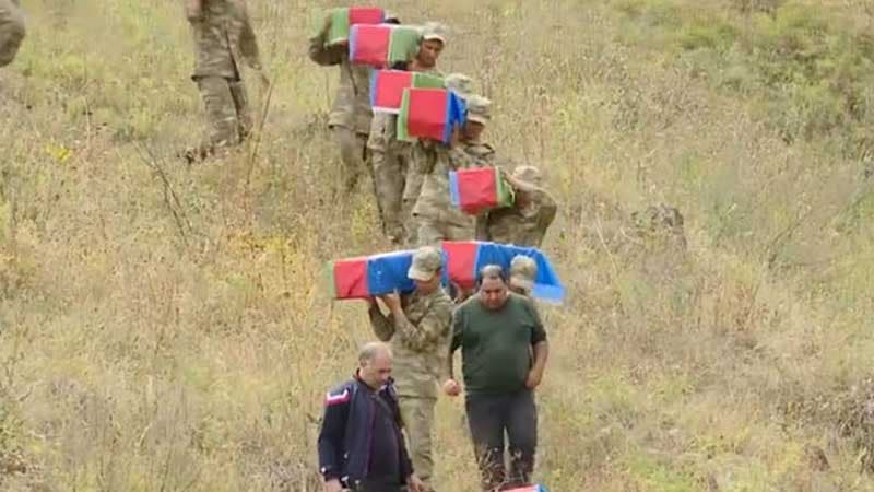 Kəlbəcərdə Başlıbel qurbanlarının məzarları açıldı (VİDEO)