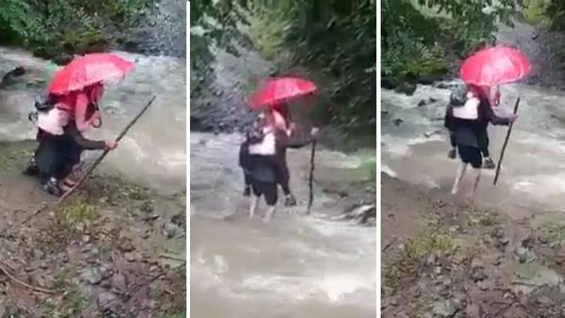 Astarada ata qızını məktəbə aparmaq üçün çayın içindən keçir (VİDEO)