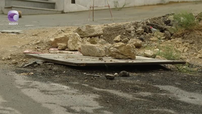 Tikinti şirkətinin yük maşınları məhəllədaxili yolu yararsız hala saldılar (VİDEO)